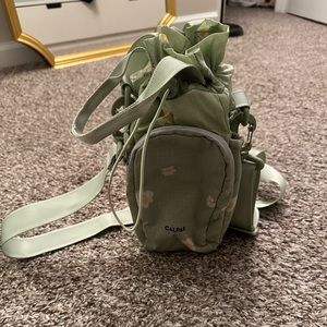 Calpak Daisy print water bottle holder